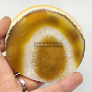 Brazilian lemon color agate in hand